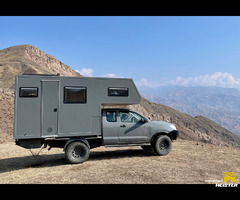 Toyota Hilux with custom cabin, offroad in comfort